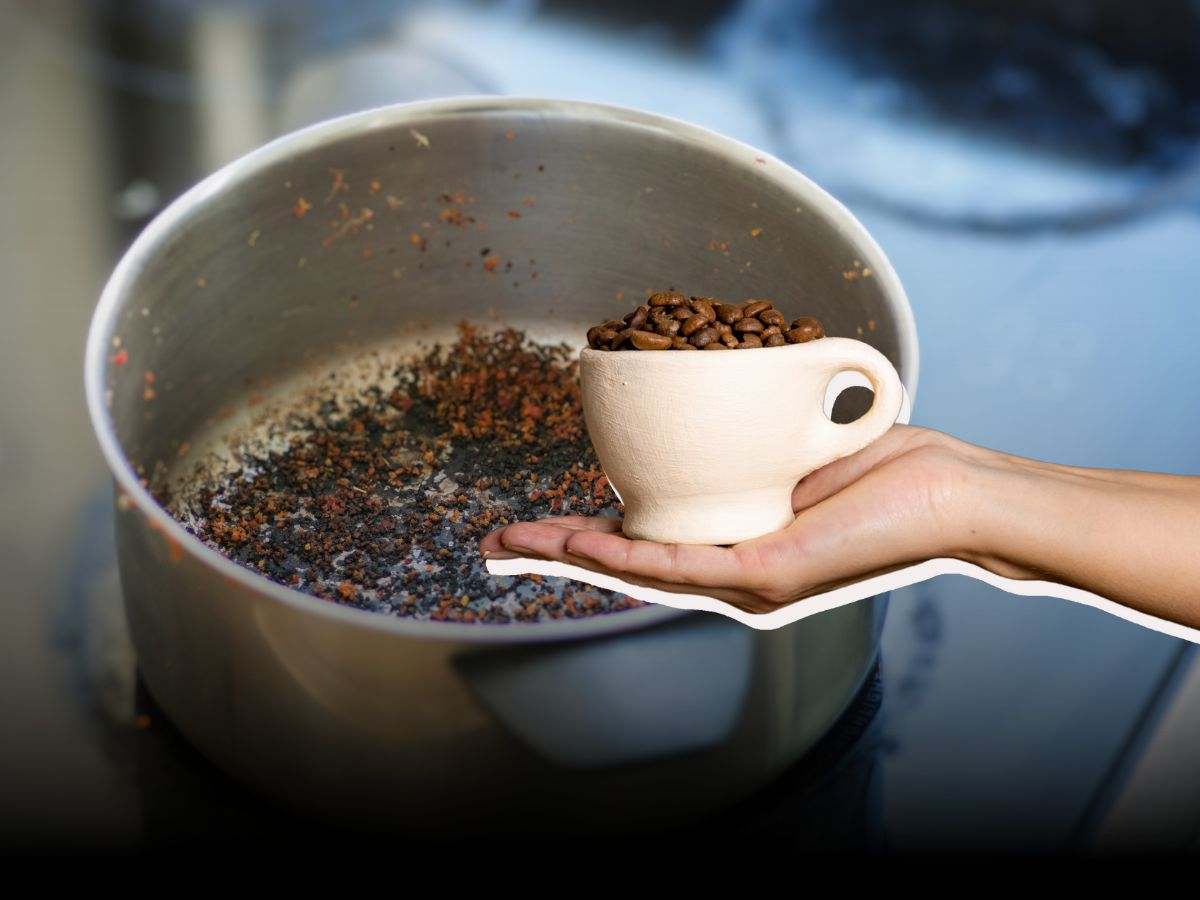 padella bruciata e mano con caffe